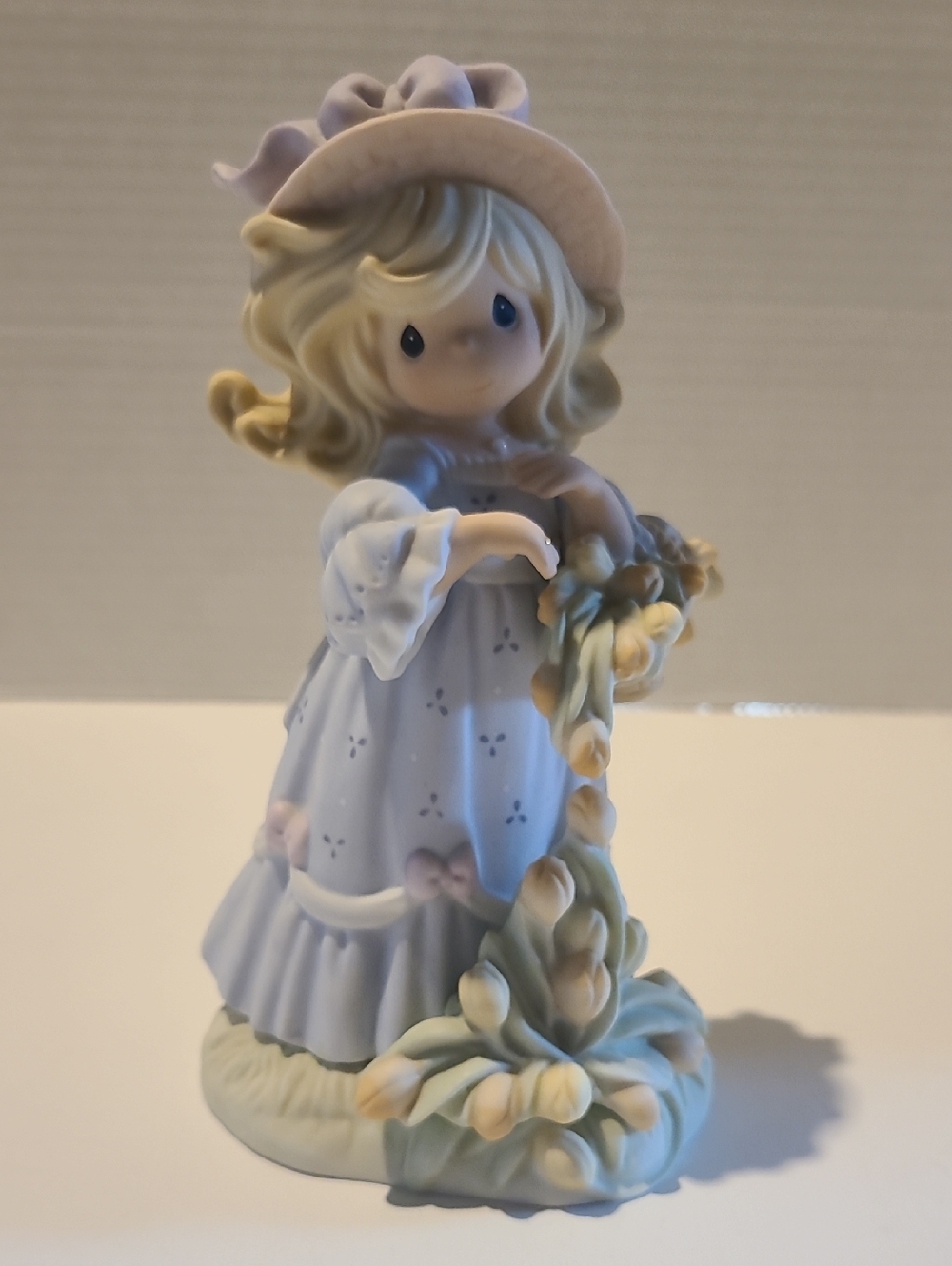 Precious Moments Pastel Blue and Cream Girl Figurine- Four Seasons Series